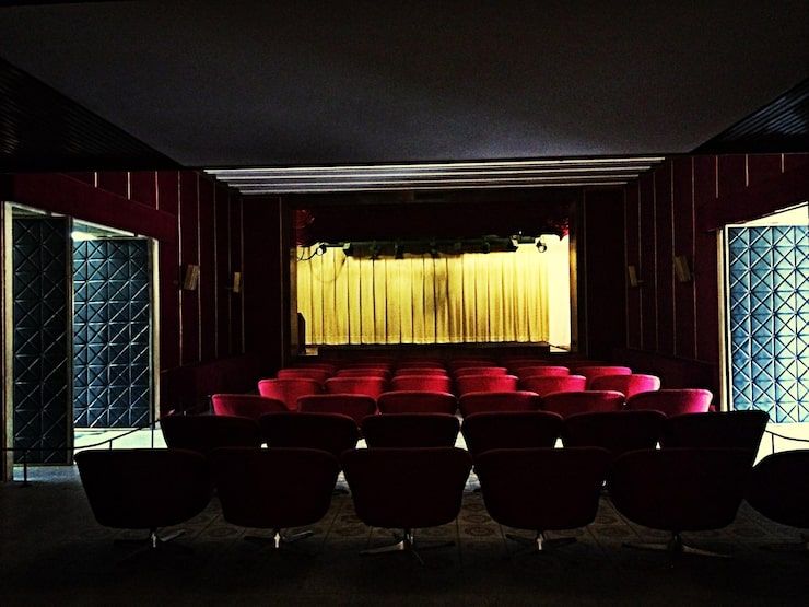 Rows of empty theater seats
